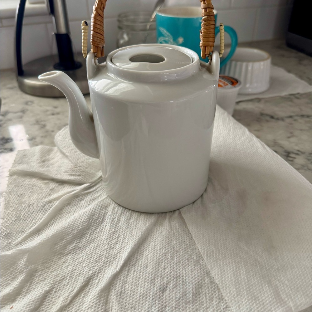 Elegant White Teapot with Wicker Handle